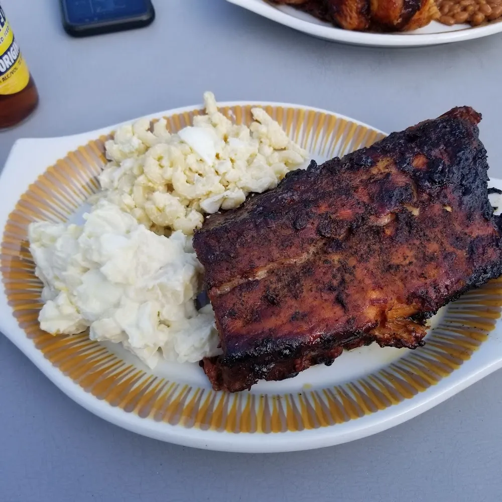 The Sunday Specials Smoked Ribs or Chicken